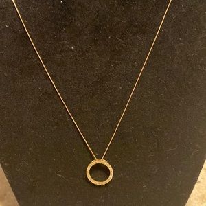 14 kt gold .23 Ct diamond circle pendant with tiny 14 kt box chain